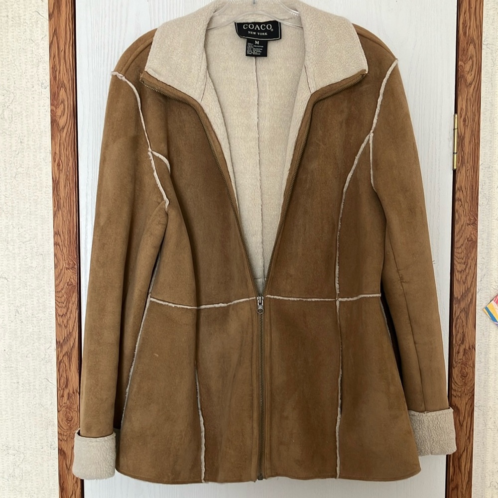 This is a Medium jacket by COACO New York